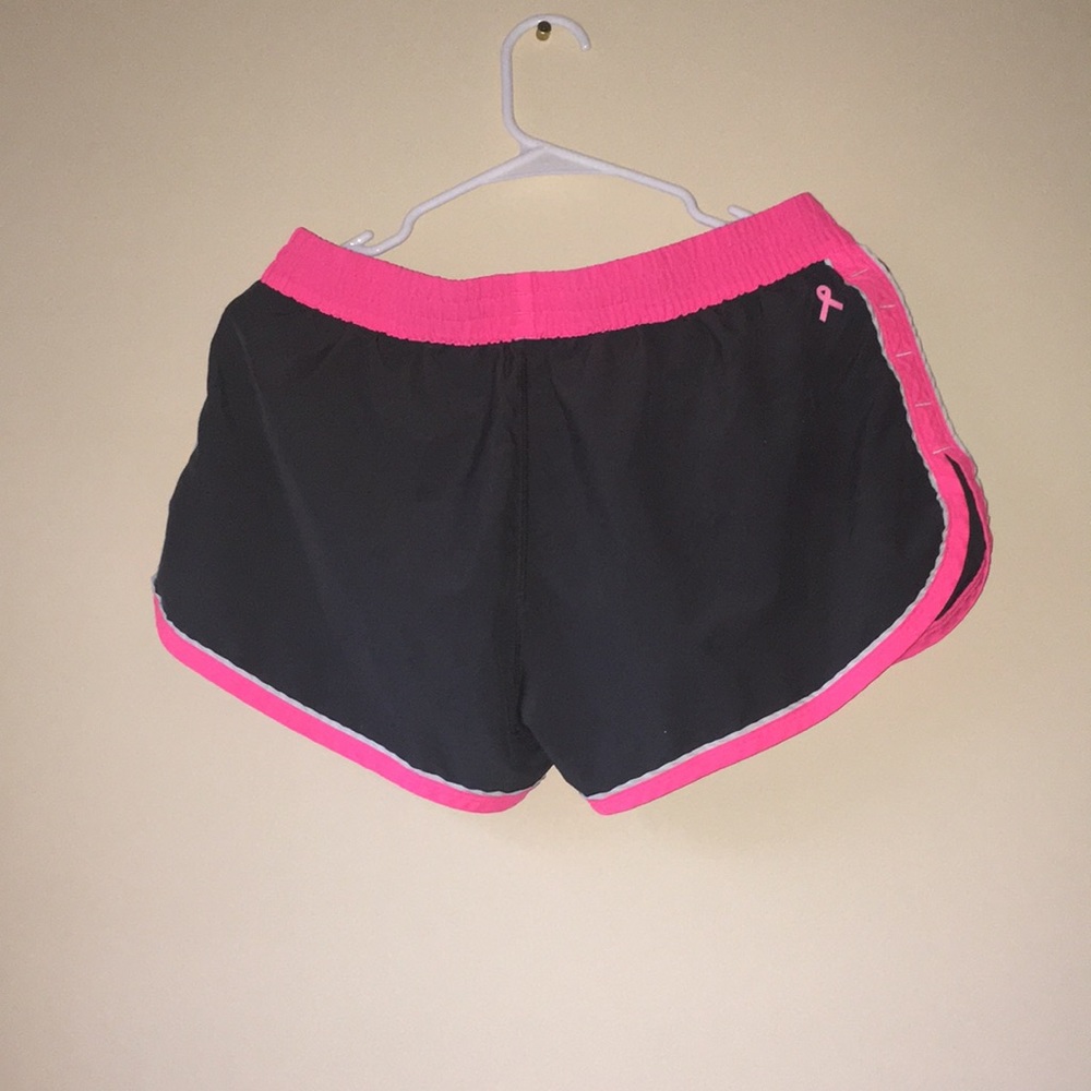 Black and pink Nike shorts